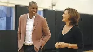 Confident Black Man toasting Oyibo Woman
